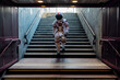© Eugenio Marongiu/Westend61 - Male astronaut moving down from stairs