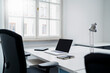 © Daniel Ingold/Westend61 - Laptop and dairy on desk at office