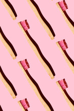 Digitally Generated Pattern With Bamboo Toothbrushes On Pink Background