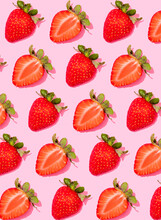 Pattern Of Rows Of Fresh Halved Strawberries Lying Against Pink Background