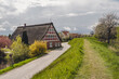 © Kerstin Bittner/Westend61 - Germany, Altes Land, Half timbered house by road in spring