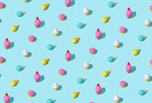 Cute Colorful Summer Pattern With Repeating Ice Cream And Cupcake Toys On Light Blue Background