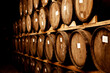 Wine barrels on old cellar. Warm and desaturated tones