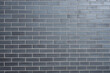 Background from a wall made of gray clinker bricks