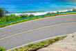 Asphalt highway and blue sea natural landscape.High angle view.