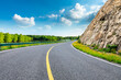 Empty asphalt road and mountain with green forest natural landscape.