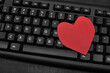 Keyboard and red heart. Online dating concept. Internet dating. Text relationship.
