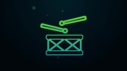 Sticker - Glowing neon line Drum with drum sticks icon isolated on black background. Music sign. Musical instrument symbol. 4K Video motion graphic animation