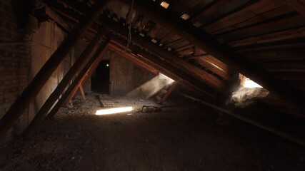 Old spooky attic of abandoned house