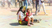 The Lots Of People In The Color Fest, Colored Faces Of The Peoples, Color Festival In India