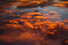 Golden Orange Glowing Clouds At Sunrise Abstract Background