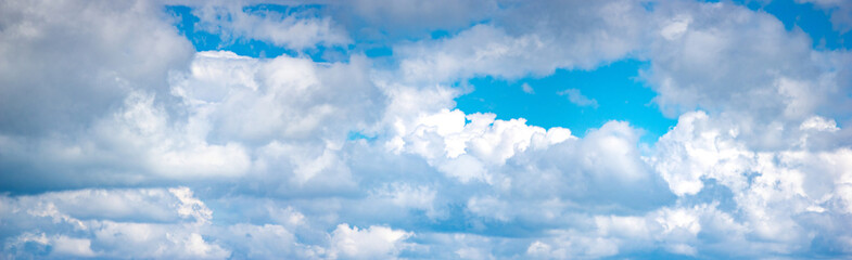 White clouds in the blue sky in summer