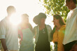 © etonastenka - Group of happy friends having fun outdoor. Young diverse culture people and friendship concept