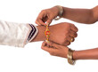© Dip Photography - Indian festival Raksha Bandhan, Raakhi on hand, Sister tie Rakhi as symbol of intense love for her brother.