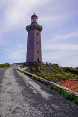 Wall Mural - Lighthouse tower access of Cap Bear on beach coast shores of the Mediterranean Sea in Port-Vendres France