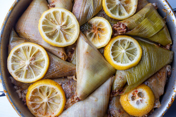 A delicious gourmet meal from traditional Turkish cuisine; Stuffed leek (Turkish name; Pirasa dolmasi, muska shaped pirasa)