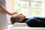 Fototapeta  - Reiki Therapy Alternative Healing Massage