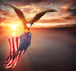 canvas print picture Eagle With American Flag Flies In Freedom At Sunset - Vintage Toned