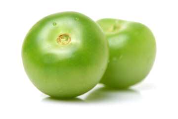 green tomatoes on white background