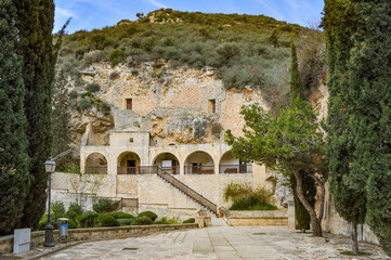 Wall Mural - In the Troodos Mountains, in 1170, the monk Neophyte founded a monastery in the cave of Enclistra. After centuries of ruin and abandonment, the monastery was rebuilt and became a holy place in Cyprus 