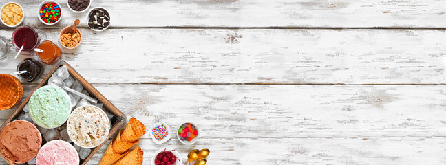 Poster - Summer ice cream bar with assorted ice cream flavors and tasty toppings. Top view corner border over a rustic white wood banner background.