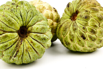 Wall Mural - Sugar apple, custard apple, Annona, sweetsop (Cherimoya) isolate on white background. Fruit Properties Lower Cholesterol Levels concept