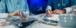 © SOMKID - Medicine doctor touching on digital tablet and hologram modern virtual screen interface icons, Medical technology and futuristic concept.