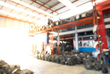 Background For Banner Design. Blur Photo Of Second-hand Spare Parts Of Old Car Parts Warehouse Store.