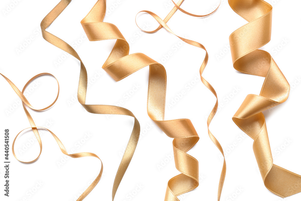 Beautiful golden ribbons on white background