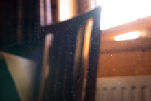 Dust Particles In An Old Vintage Wooden Room. Visible Particles Of Casual Room Dust In Strong Back Light