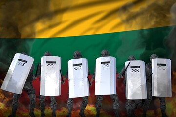 Lithuania protest stopping concept, police officers in heavy smoke and fire protecting country against disorder - military 3D Illustration on flag background