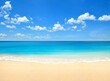 © Paitoon - Summer beach with blue sky and clouds background.