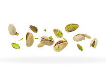 Crushed pistachios close-up hovered in white space