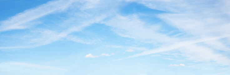 Wall Mural - blue sky background with stripes of cirrus clouds, panorama