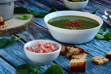 Delicious homemade spinach soup. Spinach soup. Green cream soup.