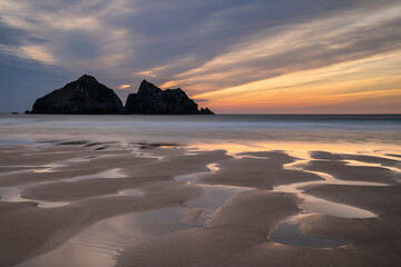 Wall Mural - absolutely stunning landscape images of holywell bay beach in cornwall uk during golden hojur sunset