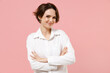 © ViDi Studio - Young smiling happy successful employee business woman corporate lawyer 20s wear classic formal white shirt work in office hold hands crossed folded isolated on pastel pink background studio portrait.