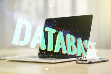 Poster - Double exposure of Database word sign on laptop background, global research and analytics concept