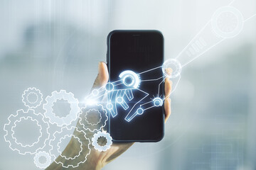 Poster - Creative abstract robotics technology hologram and hand with mobile phone on background, artificial intelligence and machine learning concept. Multi exposure