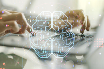 Wall Mural - double exposure of creative artificial intelligence symbol with hands typing on laptop on background