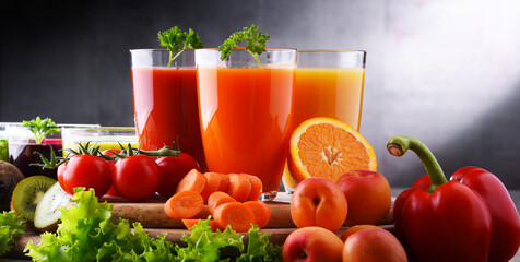 Wall Mural - Glasses with fresh organic vegetable and fruit juices