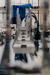 Canvas Print - Vertical shot of machine tools at a factory