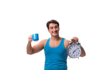 Wall Mural - Man waking up with alarm clock isolated on white