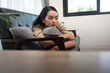 © PK Studio - Young woman lying at home living room couch feeling sad tired and worried suffering depression in mental health