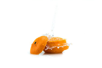 Wall Mural - orange slice in water splash on white background