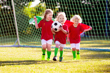 Canvas Print - Portugal football fan kids. Children play soccer.