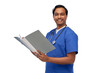 © Syda Productions - healthcare, profession and medicine concept - happy smiling indian doctor or male nurse in blue uniform with folder report over white background
