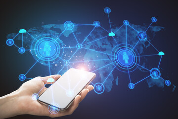 Poster - Close up of hands using cellphone with abstract social network hologram on blue background. Recruiting and cloud technology concept.