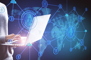 Poster - Close up of hands using notebook with abstract social network hologram on blue background. Recruiting and cloud technology concept.