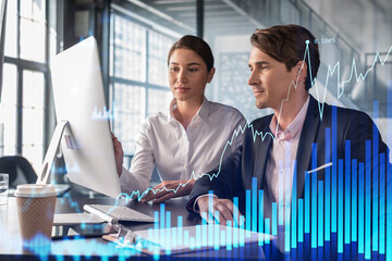 Wall Mural - Businessman and businesswoman in formal wear working together to optimize trading strategy at corporate finance fund. Forex chart hologram over office background with panoramic windows